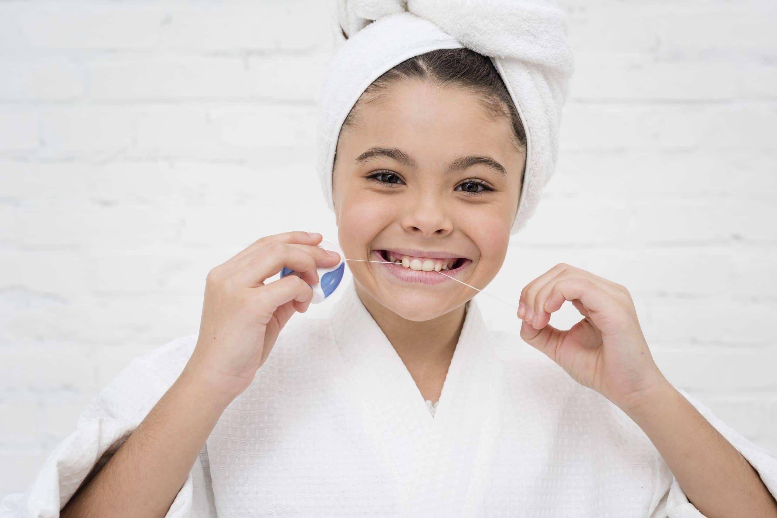 Como usar o fio dental: